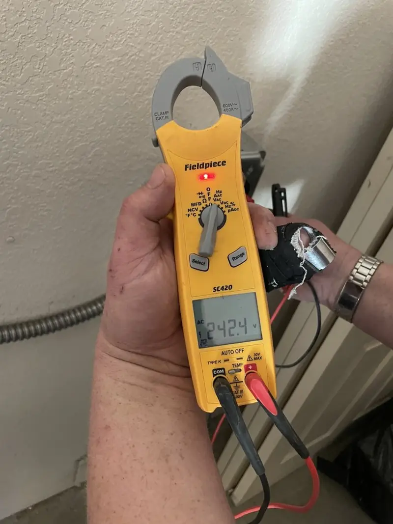 Voltage testing with clamp meter during Hot Tub / Pool Electrical Wiring in Riverside